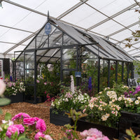 12x16 rhino greenhouse surrounded by midnight slate raised beds