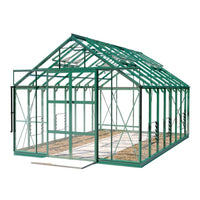 A green-framed Rhino Greenhouse with a pitched roof stands empty, displaying transparent walls and sliding doors, set against a plain white background.