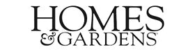 The image shows the text HOMES & GARDENS in a bold, serif font, centered on a white background.